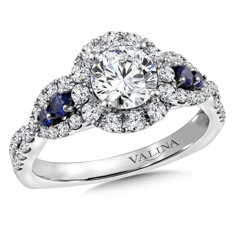 Diamond and Blue Sapphire Halo Engagement Ring