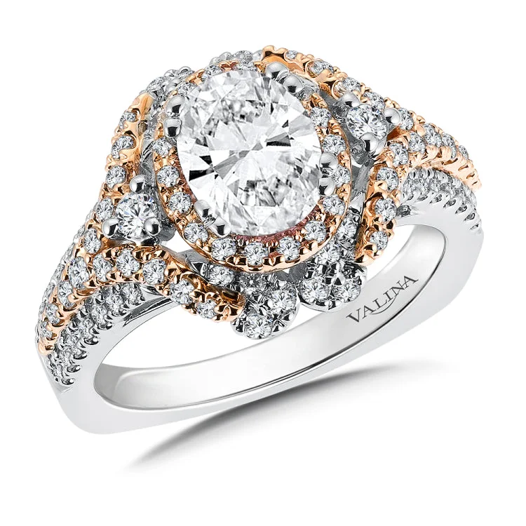 Oval halo engagement ring mounting in 14k white gold with rose gold accents and diamond side stones.